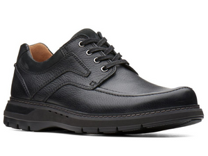 This casual black leather walking shoe has a cushioned sole that is solid black. A moccasin stitch on the top upper and nubuck on the padded collar and tongue.