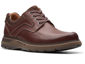 This casual brown leather walking shoe has a cushioned sole that is two toned brown.  A moccasin stitch on the top upper and nubuck on the padded collar and tongue.