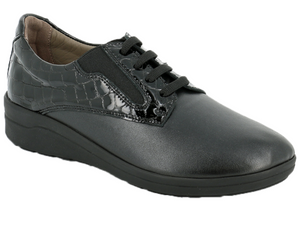 Black patent quilted leather lace up women's shoe with a plain stretchable front that accommodates feet problem like bunions, hammer toes, etc.  The twin gores at the side of the laces allow the foot to move if swollen or if needs a little more space without being loose.  Leather lined inside so feet can breath along with a cushioned bottom sole.  The problem solver shoe!